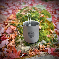 PDW 375ml double wall insulated titanium mug All Terrain outside on mossy rock